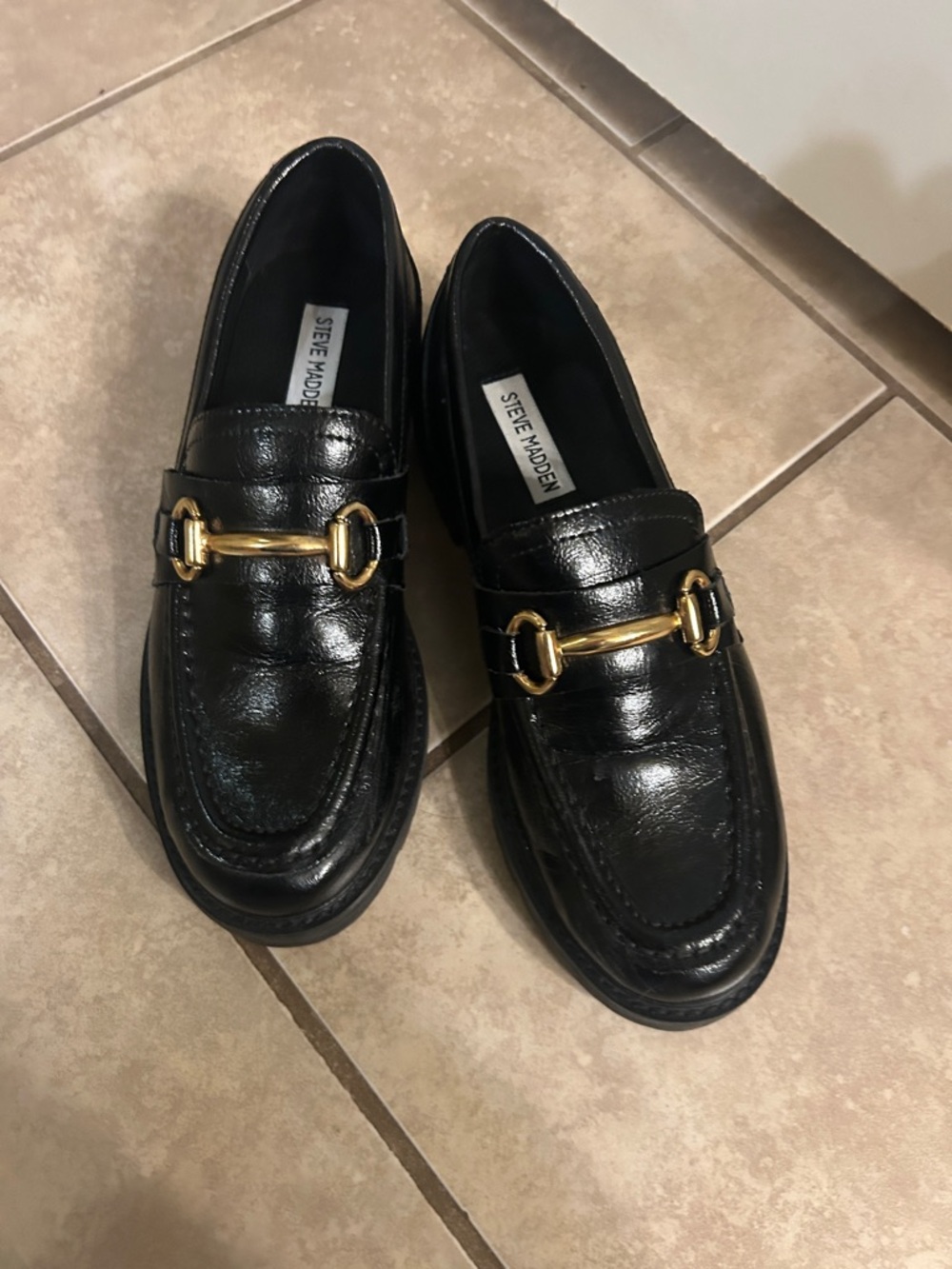 Steve Madden Black Leather Slip-On Loafers with Gold Hardware